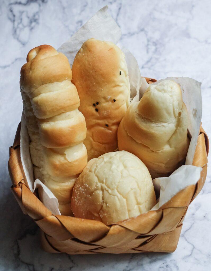 4 pieces of bread in a basket