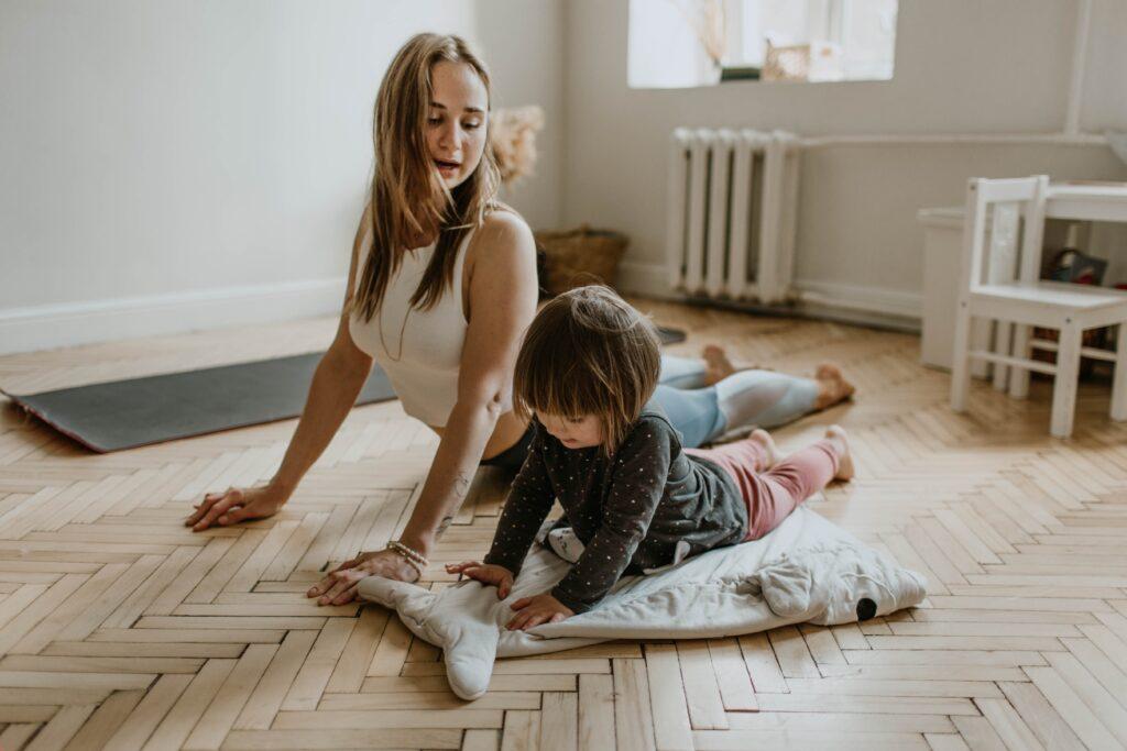 mom and child working out at home